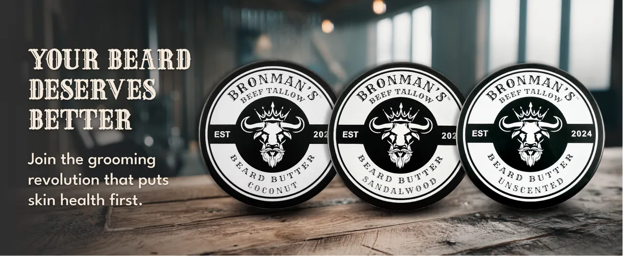 Three Bronman’s beard-butter tins on a wooden surface.